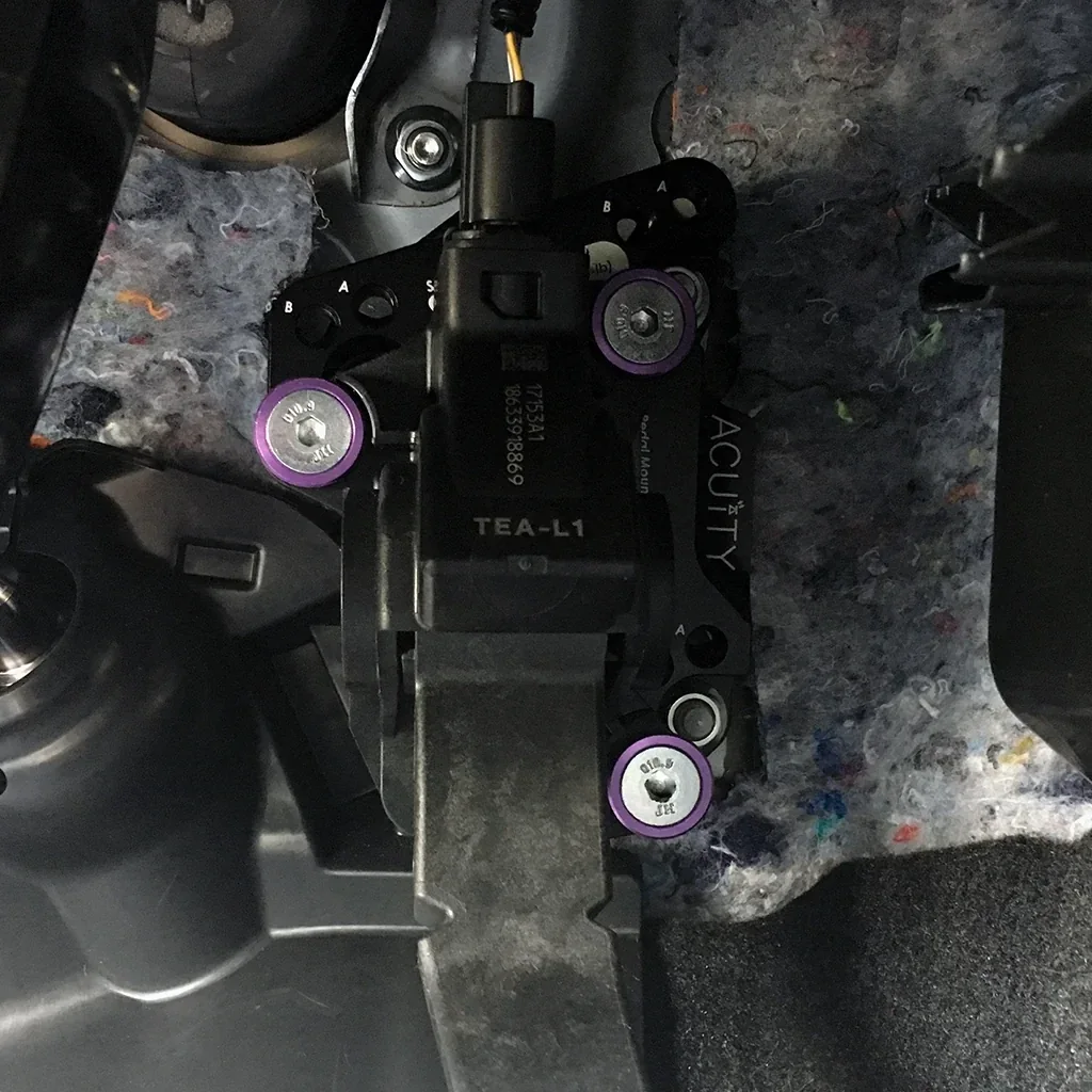 Pedal spacer installed behind the accelerator pedal